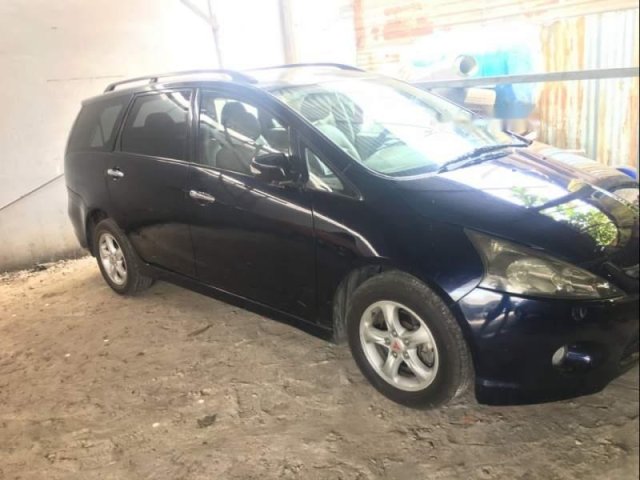 Gia đình bán Mitsubishi Grandis năm 2006, màu xanh lam0