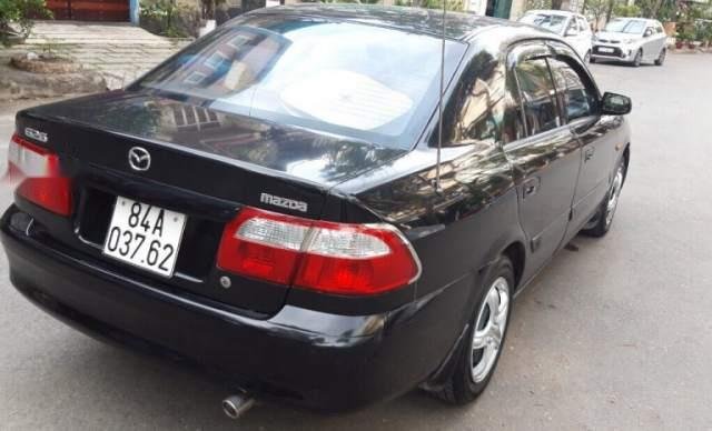 Chính chủ bán Mazda 626 năm 2002, màu đen, xe nhập0