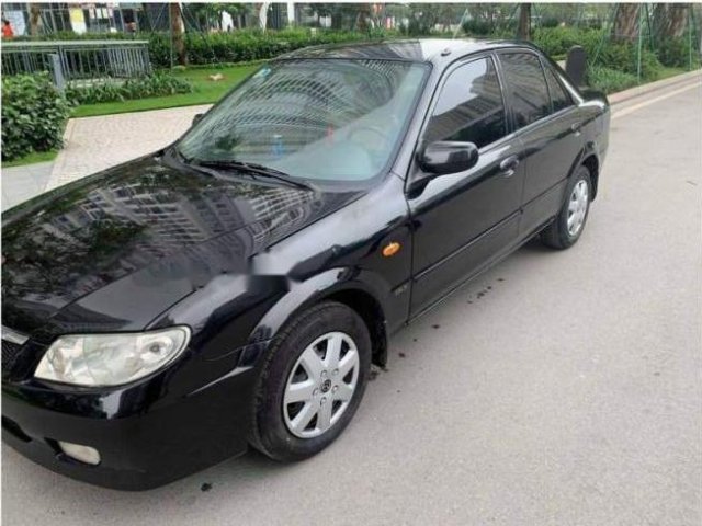 Cần bán Mazda 323 sản xuất năm 2003, xe gia đình