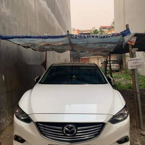 Bán xe Mazda 6 2.0 sản xuất năm 2016, màu trắng, đăng kí chính chủ biển Hà Nội