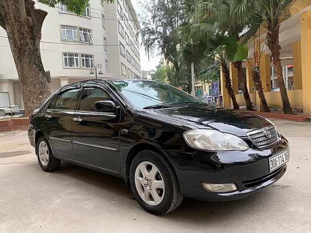 Cần bán xe Toyota Corolla altis đời 2005, màu đen, xe đẹp công chức đi ít, giữ gìn cẩn thận0