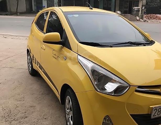 Cần bán gấp Hyundai Eon đời 2012, màu vàng, nhập khẩu, Đk lần đầu 2014