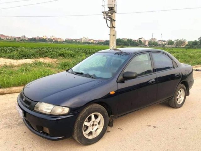 Cần bán gấp Mazda 323 sản xuất năm 1997, nội - ngoại thất đẹp0