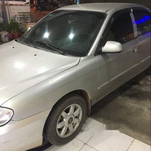 Cần bán gấp Kia Spectra 2004, màu bạc, giá tốt0