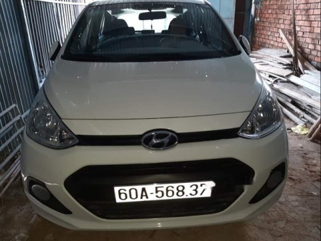 Bán gấp Hyundai Grand i10 năm 2016, màu trắng xe gia đình