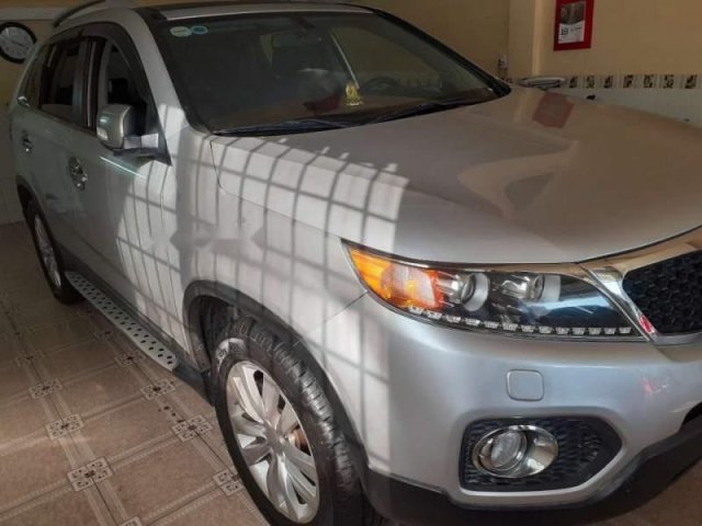 Bán xe Kia Sorento sản xuất năm 2013, màu bạc số sàn, giá chỉ 495 triệu