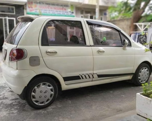 Cần bán Chevrolet Matiz đời 2004, màu trắng, máy móc đi xa tốt0