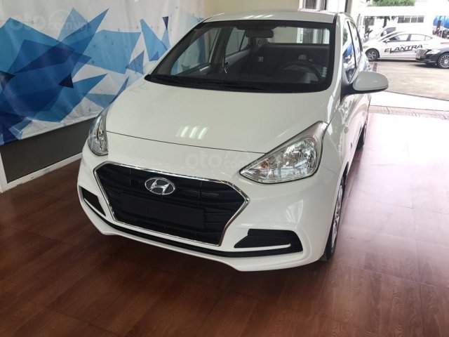 Bán Hyundai Grand I10 sedan Base trắng giao ngay, lấy xe chỉ với 120tr, hỗ trợ đăng ký Grab! LH: 0977 139 312