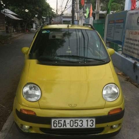 Cần bán xe Daewoo Matiz đời 1999, màu vàng, nhập khẩu, xe còn đẹp máy lạnh buốt0