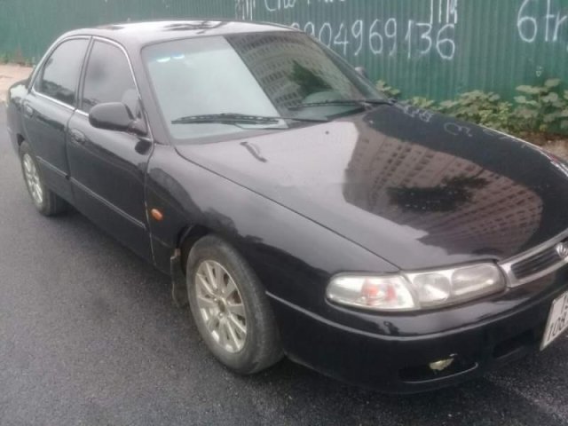 Bán xe Mazda 626 năm sản xuất 1994, màu đen0