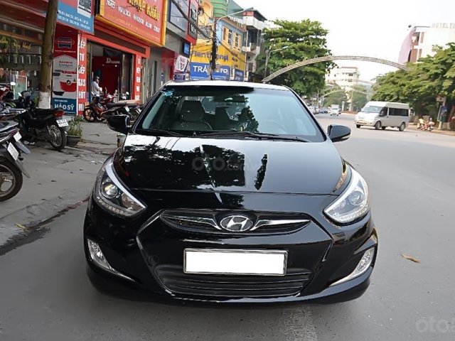 Bán Hyundai Accent 1.4 MT năm 2014, màu đen, xe nhập, giá tốt0