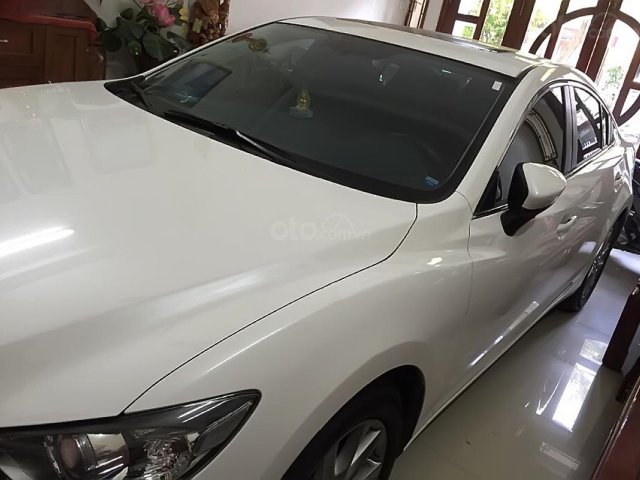 Cần bán xe cũ Mazda 6 2.0 AT đời 2016, màu trắng