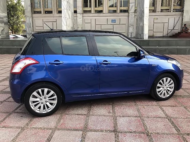 Bán xe Suzuki Swift 1.4 AT năm sản xuất 2016, màu xanh lam  