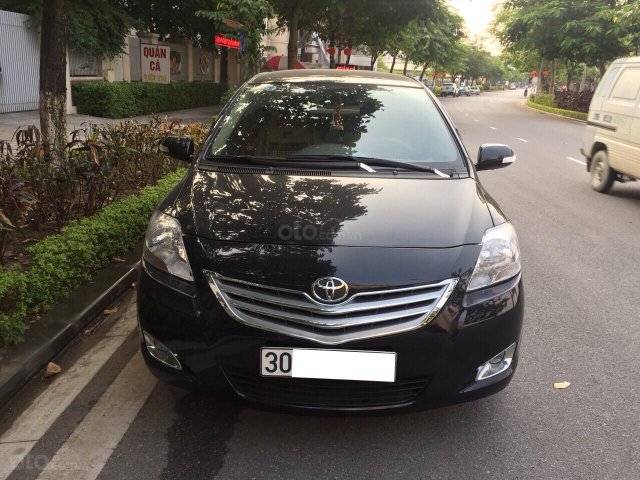 Chính chủ nhà tôi cần bán gấp chiếc Toyota Vios 1.5E 2012, số sàn, màu đen, chính chủ gia đình tôi LH 0984386598