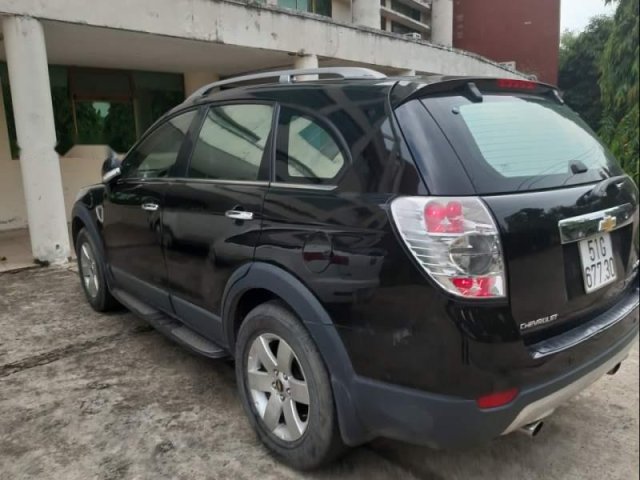 Cần bán xe Chevrolet Captiva MAXX đời 2010, màu đen, xe thường xuyên bảo hành, máy chưa bung0