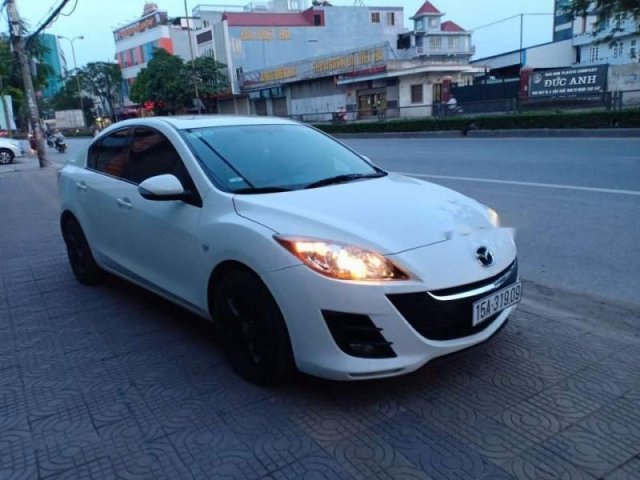 Bán Mazda 3 AT sản xuất năm 2011, màu trắng, nhập khẩu nguyên chiếc, xe đẹp0