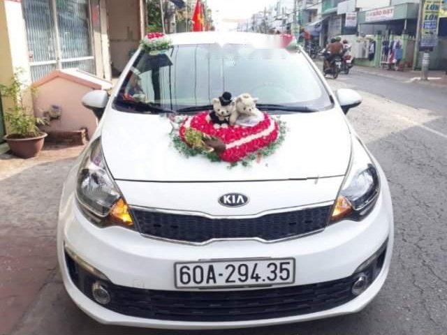 Cần bán xe Kia Rio 1.4 AT 2015, màu trắng, giá 455tr