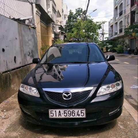 Bán Mazda 6 MT 2005, màu đen, số sàn, 240 triệu