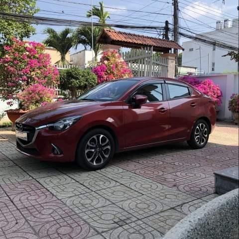 Cần bán xe Mazda 2 sản xuất năm 2016, màu đỏ, giá tốt