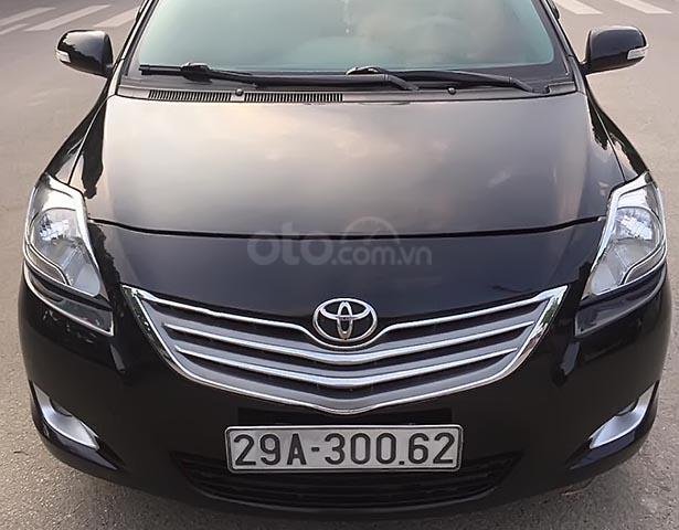 Bán xe Toyota Vios 1.5E đời 2011, màu đen, xe gia đình