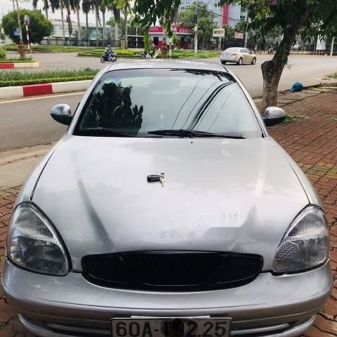 Gia đình bán Daewoo Nubira đời 2002, màu bạc, nhập khẩu nguyên chiếc0