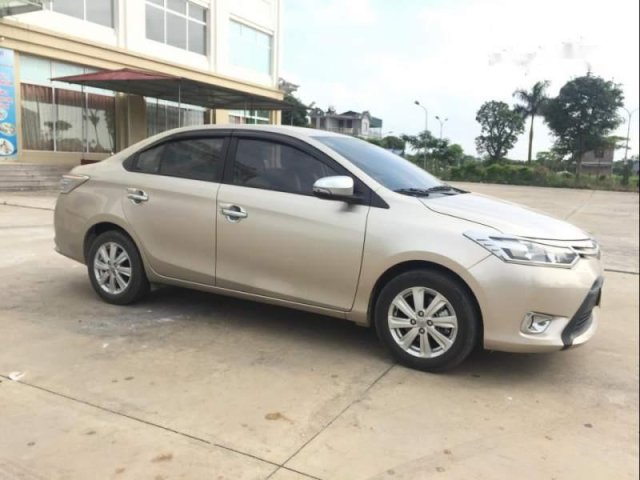 Bán Toyota Vios 1.5E MT đời 2018, màu vàng xe gia đình