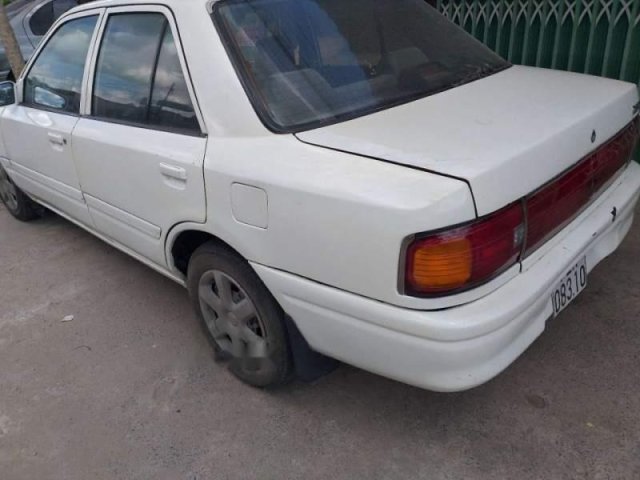 Cần bán xe Mazda 323 sản xuất năm 1994, màu trắng, nhập khẩu nguyên chiếc, 55 triệu