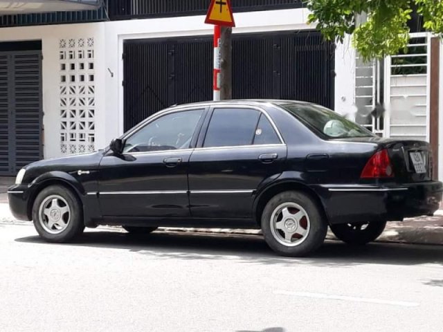 Chính chủ bán Ford Laser sản xuất 2003, màu xanh đen