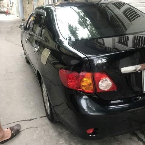 Bán Toyota Corolla altis năm sản xuất 2010, màu đen, 465 triệu