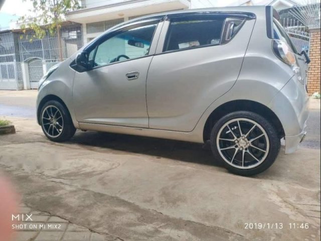 Gia đình bán xe Chevrolet Spark 1.2 LS năm sản xuất 2013, màu bạc