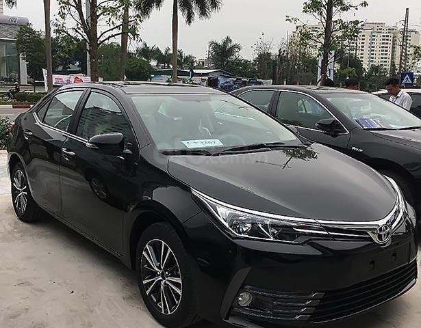 Cần bán xe Toyota Corolla altis 1.8G AT năm 2019, màu đen0