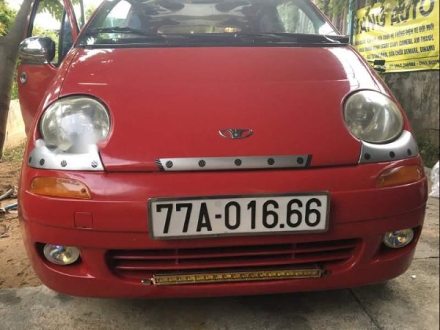 Gia đình bán xe Daewoo Matiz 2000, màu đỏ, xe nhập0