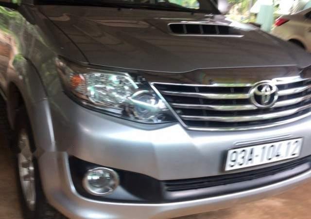 Bán Toyota Fortuner G 2013, màu bạc, giá 710tr