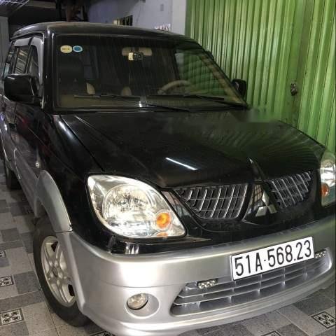 Cần bán Mitsubishi Jolie năm sản xuất 2005, màu đen, xe nhập còn mới