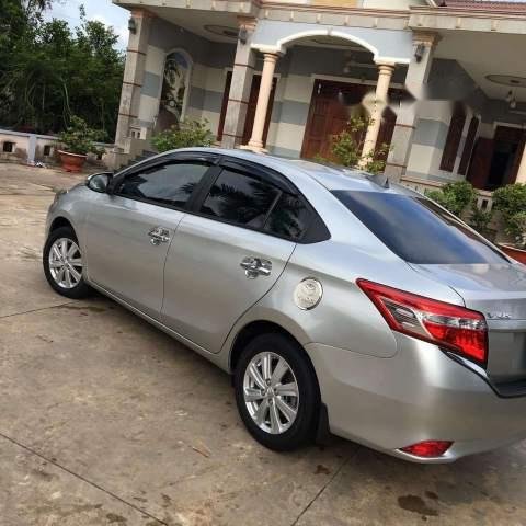 Bán Toyota Vios E năm 2016, màu bạc số sàn