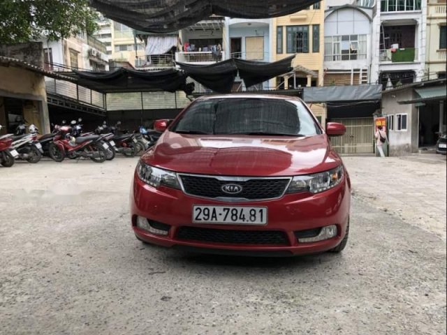 Bán Kia Forte AT năm sản xuất 2013, màu đỏ, chính chủ0