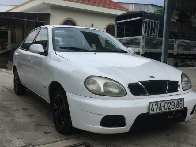 Cần bán Daewoo Lanos đời 2004, màu trắng chính chủ0