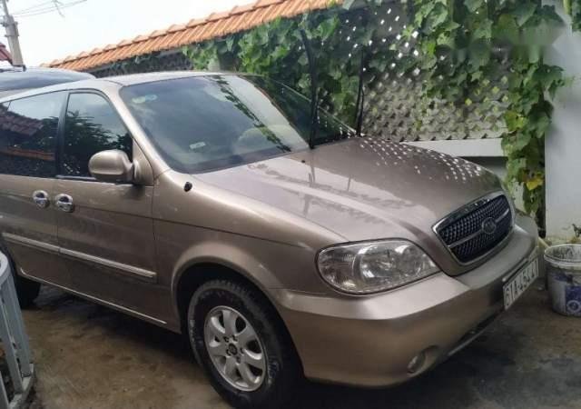 Cần bán lại xe Kia Carnival GS sản xuất 2009, màu nâu, xe nhập0