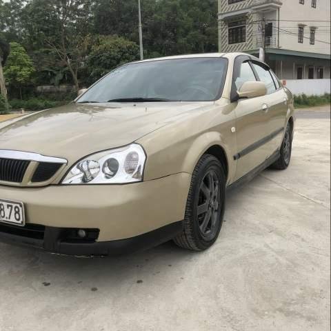 Bán Daewoo Magnus đời 2004, màu vàng số sàn0