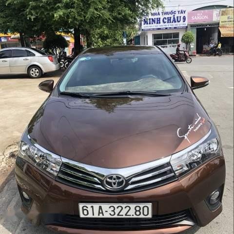 Chính chủ bán Toyota Corolla altis 2015, màu nâu, giá 625tr