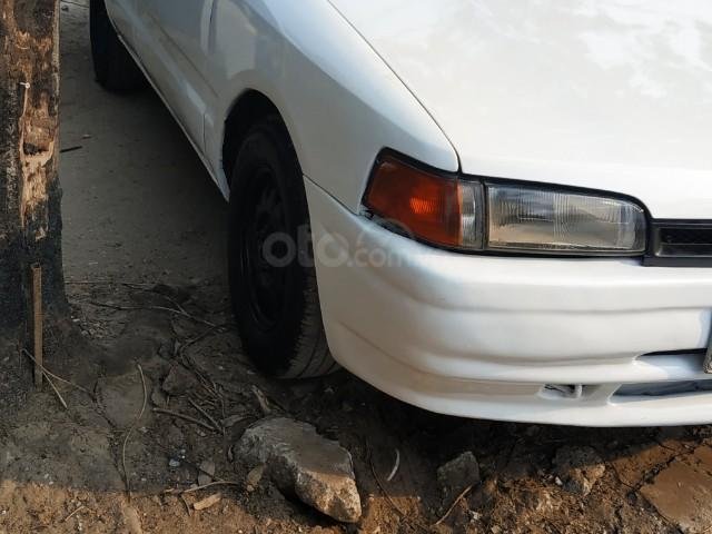 Bán ô tô Mazda 323 sản xuất năm 1996, màu trắng, xe nhập0