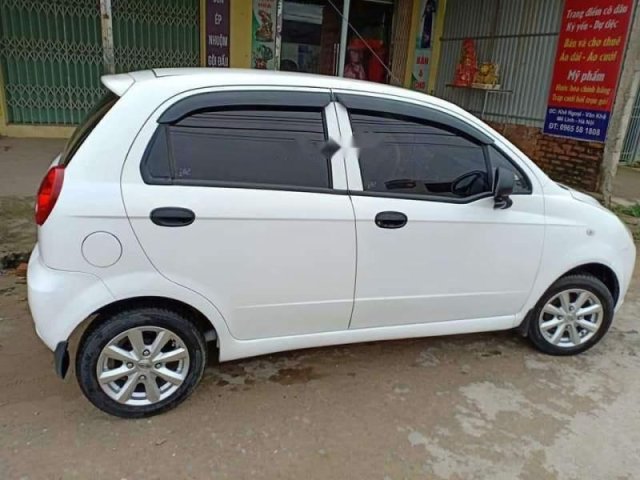 Cần bán gấp Daewoo Matiz năm sản xuất 2009, màu trắng 0