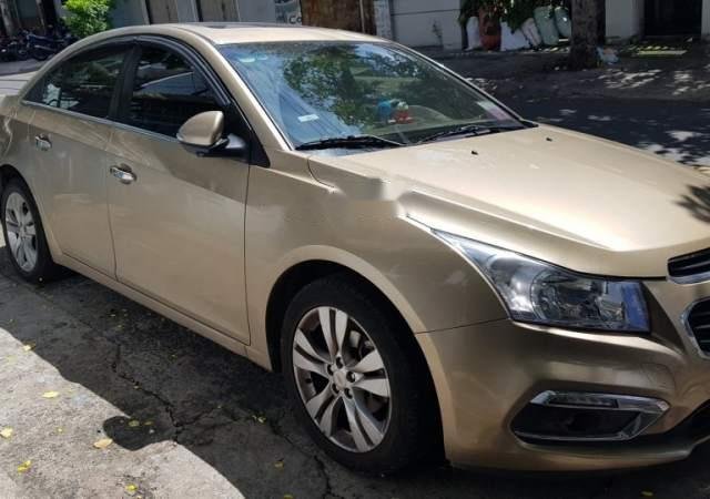 Bán xe Chevrolet Cruze 1.8  LTZ sản xuất năm 2015, màu vàng, nhập khẩu 0