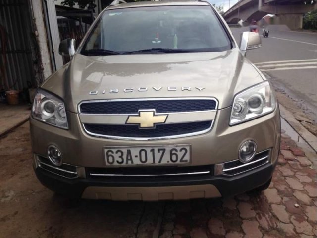 Cần bán xe Chevrolet Captiva đời 2009, màu vàng cát, số sàn0