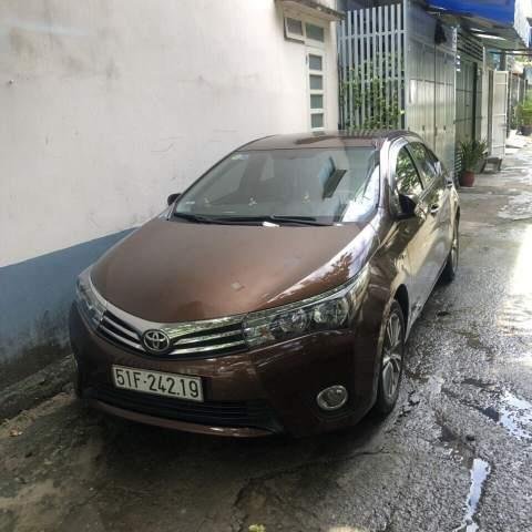 Bán ô tô Toyota Corolla altis 2015, màu nâu, máy êm ru