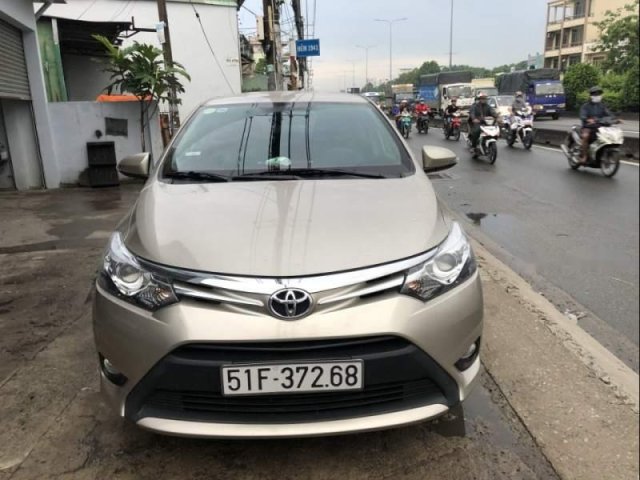 Bán xe Toyota Vios G đời 2015, màu vàng cát0