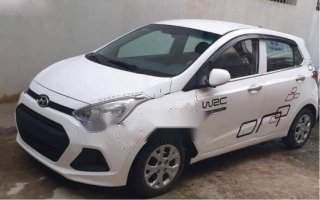 Bán xe Hyundai Grand i10 đời 2015, màu trắng, số sàn 0