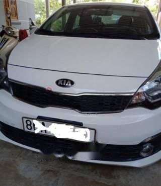 Cần bán Kia Rio 1.4 MT năm sản xuất 2015, màu trắng, không lỗi lầm, không tiếp cò lái0