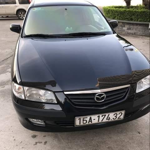 Bán Mazda 626 sản xuất năm 2001, màu đen, xe vừa bọc lại da nội thất0