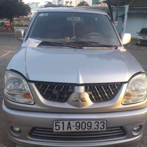 Bán Mitsubishi Jolie đời 2004, màu bạc, xe nhập